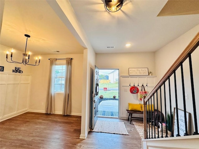 135 Softwood Ct, Dawsonville, GA 30534 - entrance foyer with a chandelier and wood finished floors