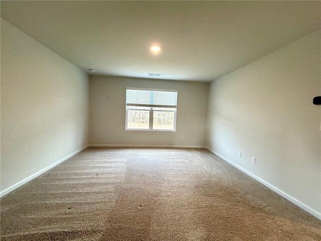 135 Softwood Ct, Dawsonville, GA 30534 - carpeted empty room with baseboards
