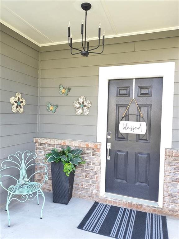 135 Softwood Ct, Dawsonville, GA 30534 - view of exterior entry featuring covered porch and stone siding
