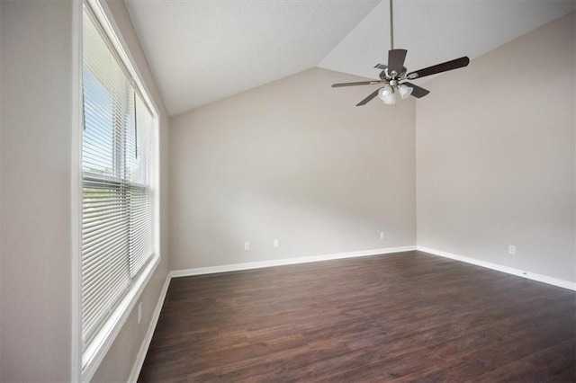 3915 Cypress Pointe Dr, Union City, GA 30291 - unfurnished room with vaulted ceiling, a ceiling fan, dark wood-style floors, and baseboards