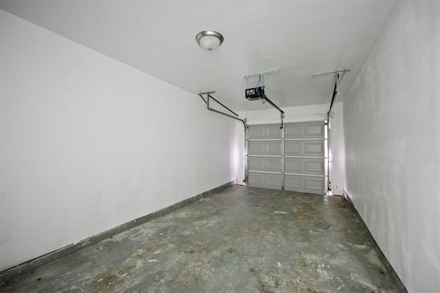 3915 Cypress Pointe Dr, Union City, GA 30291 - garage featuring baseboards and a garage door opener