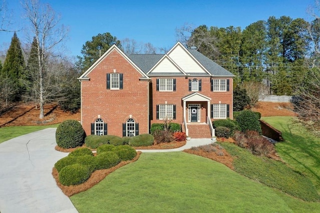 view of front of home with a front yard