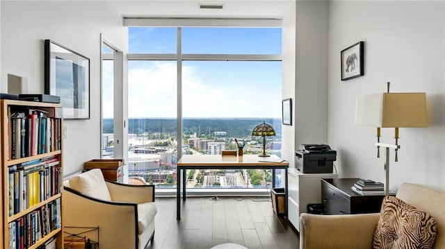 45 Ivan Allen Jr Blvd NW Unit 2705, Atlanta, GA 30308 - living area with expansive windows and dark wood-style floors