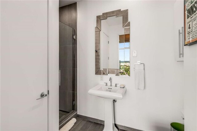 45 Ivan Allen Jr Blvd NW Unit 2705, Atlanta, GA 30308 - bathroom featuring a stall shower and a sink