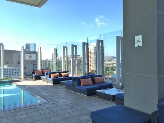 45 Ivan Allen Jr Blvd NW Unit 2705, Atlanta, GA 30308 - view of swimming pool with an outdoor hangout area, a swimming pool, a view of skyline, and a patio area