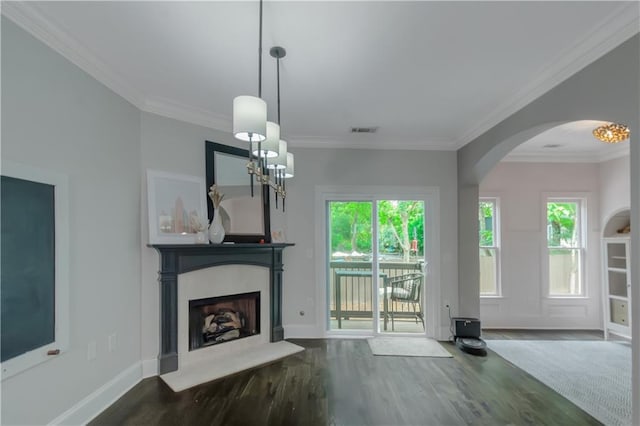 1786 Dekalb Ave NE, Atlanta, GA 30307 - unfurnished living room with wood finished floors, arched walkways, ornamental molding, a fireplace, and baseboards