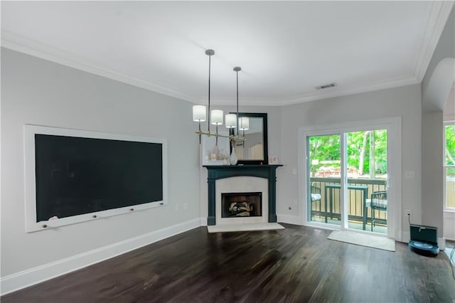 1786 Dekalb Ave NE, Atlanta, GA 30307 - unfurnished living room with wood finished floors, healthy amount of natural light, ornamental molding, baseboards, and a chandelier