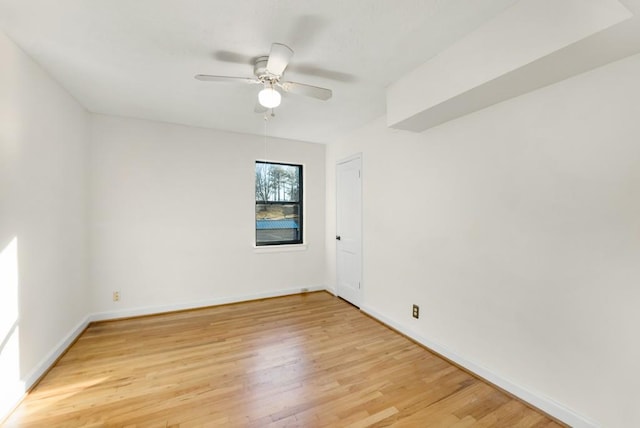 unfurnished room with light hardwood / wood-style floors and ceiling fan