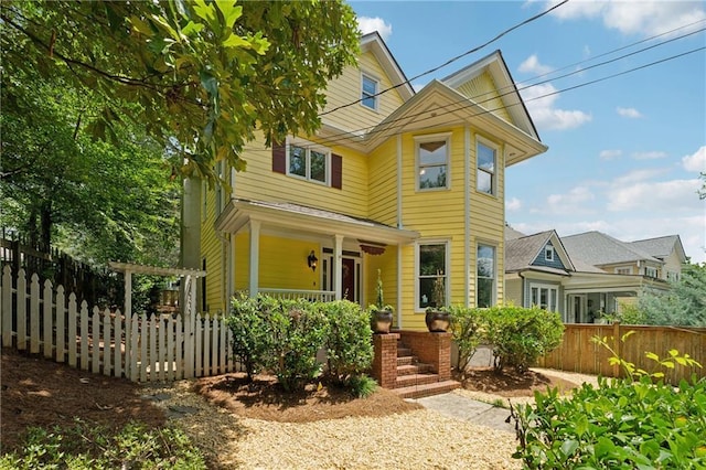 view of front of property featuring covered porch