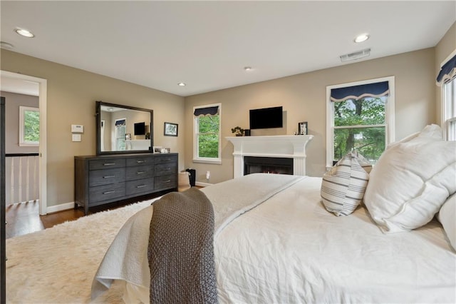 bedroom featuring hardwood / wood-style floors