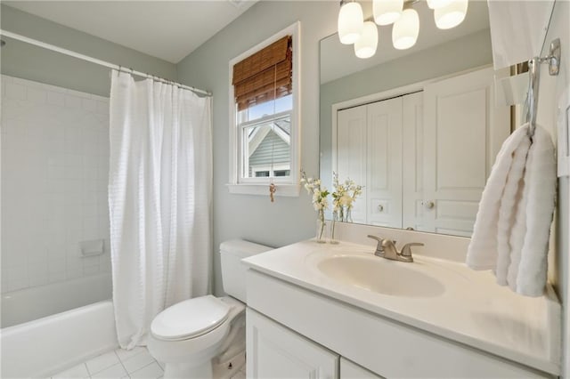 full bathroom featuring tile patterned floors, vanity, toilet, and shower / bath combo with shower curtain