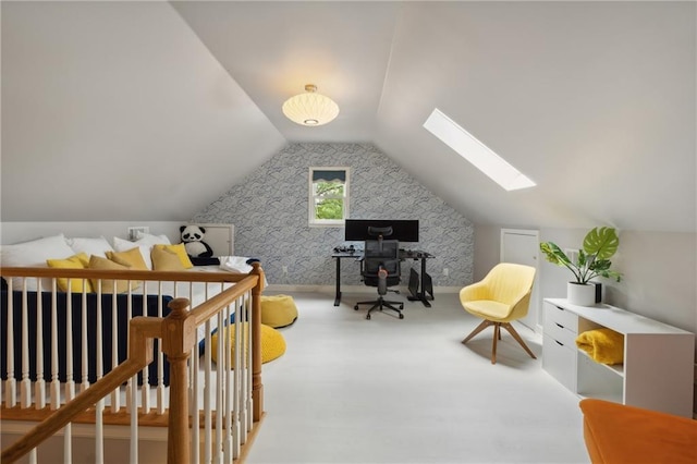 interior space featuring lofted ceiling with skylight