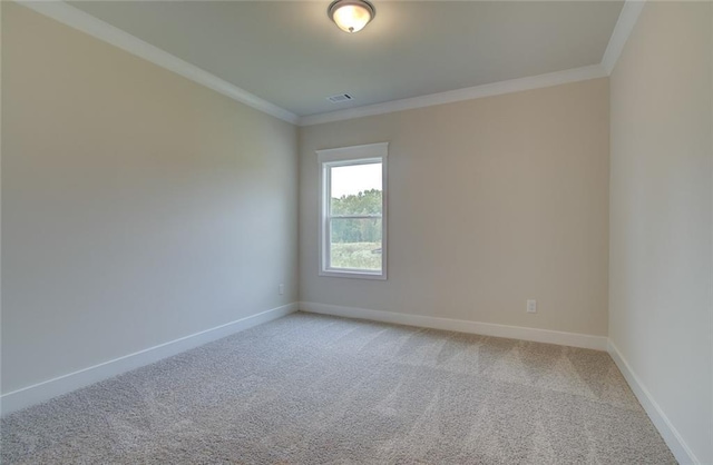 unfurnished room featuring light carpet, baseboards, and ornamental molding