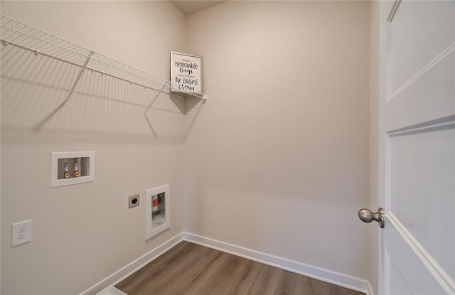 laundry room with wood finished floors, baseboards, hookup for an electric dryer, laundry area, and washer hookup