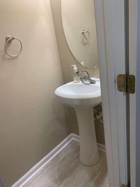 2253 Dillard Xing, Tucker, GA 30084 - bathroom with wood finished floors and baseboards