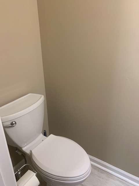 2253 Dillard Xing, Tucker, GA 30084 - bathroom with baseboards and toilet