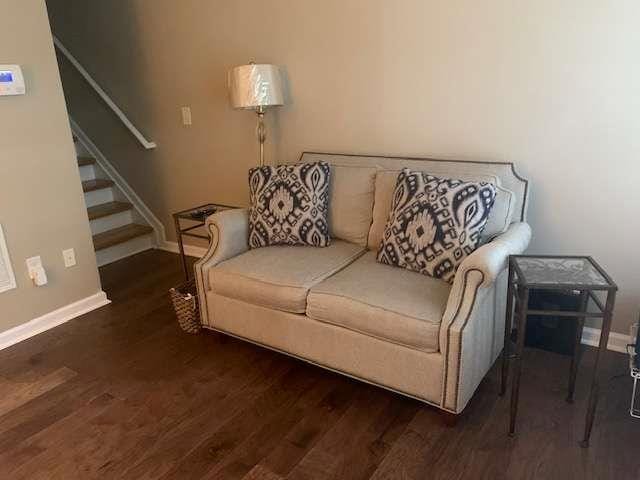 2253 Dillard Xing, Tucker, GA 30084 - living room featuring baseboards, wood finished floors, and stairs