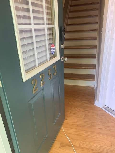 2253 Dillard Xing, Tucker, GA 30084 - interior space with light wood finished floors and stairs