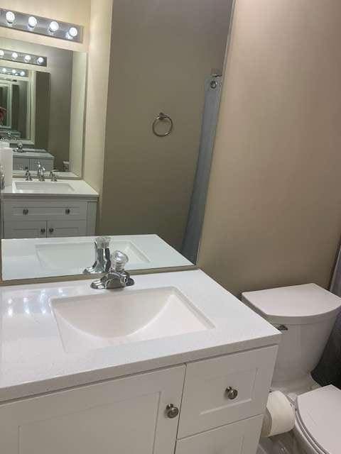2253 Dillard Xing, Tucker, GA 30084 - bathroom with toilet and vanity
