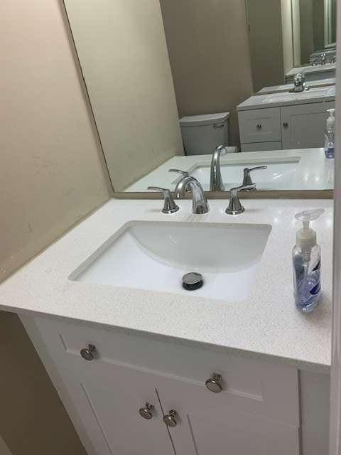 2253 Dillard Xing, Tucker, GA 30084 - bathroom featuring toilet and vanity