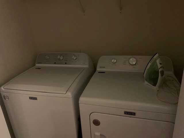 2253 Dillard Xing, Tucker, GA 30084 - clothes washing area featuring washer and dryer and laundry area