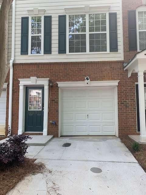 2253 Dillard Xing, Tucker, GA 30084 - garage featuring concrete driveway