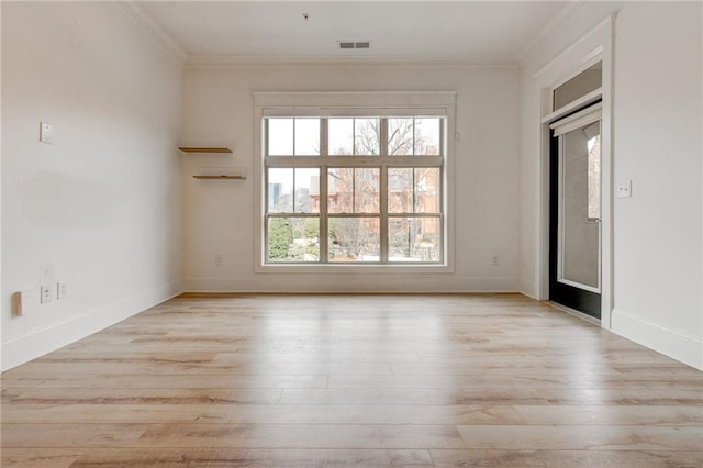 625 Piedmont Ave NE Unit 2004, Atlanta, GA 30308 - empty room with light wood-type flooring, ornamental molding, and baseboards