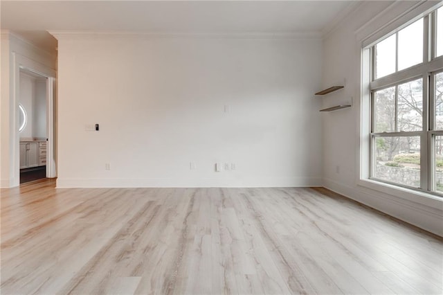 625 Piedmont Ave NE Unit 2004, Atlanta, GA 30308 - empty room with plenty of natural light, crown molding, wood finished floors, and baseboards