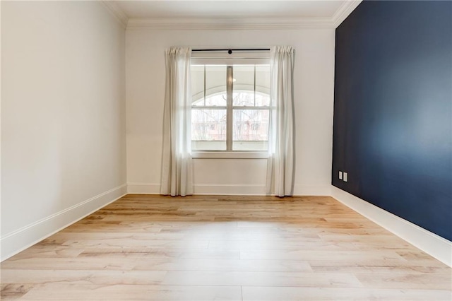 625 Piedmont Ave NE Unit 2004, Atlanta, GA 30308 - spare room with light wood-style flooring, ornamental molding, and baseboards