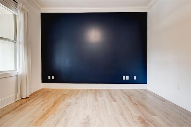 625 Piedmont Ave NE Unit 2004, Atlanta, GA 30308 - spare room featuring ornamental molding, wood finished floors, and baseboards