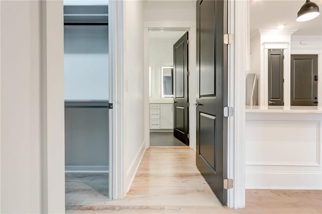 625 Piedmont Ave NE Unit 2004, Atlanta, GA 30308 - hallway featuring crown molding and wood finished floors