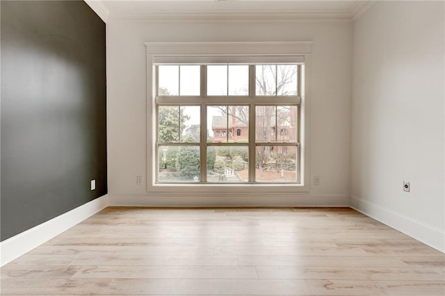 625 Piedmont Ave NE Unit 2004, Atlanta, GA 30308 - spare room featuring ornamental molding, light wood finished floors, and baseboards