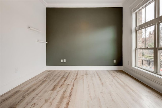 625 Piedmont Ave NE Unit 2004, Atlanta, GA 30308 - unfurnished room with crown molding, wood finished floors, and baseboards