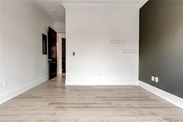 625 Piedmont Ave NE Unit 2004, Atlanta, GA 30308 - unfurnished room featuring crown molding, light wood finished floors, and baseboards