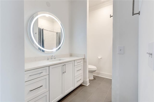 625 Piedmont Ave NE Unit 2004, Atlanta, GA 30308 - full bath featuring toilet, vanity, baseboards, tile patterned floors, and crown molding