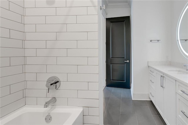 625 Piedmont Ave NE Unit 2004, Atlanta, GA 30308 - bathroom featuring tile patterned floors, vanity, ornamental molding, baseboards, and bathtub / shower combination