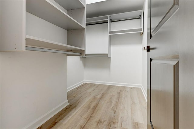 625 Piedmont Ave NE Unit 2004, Atlanta, GA 30308 - walk in closet with light wood-style flooring