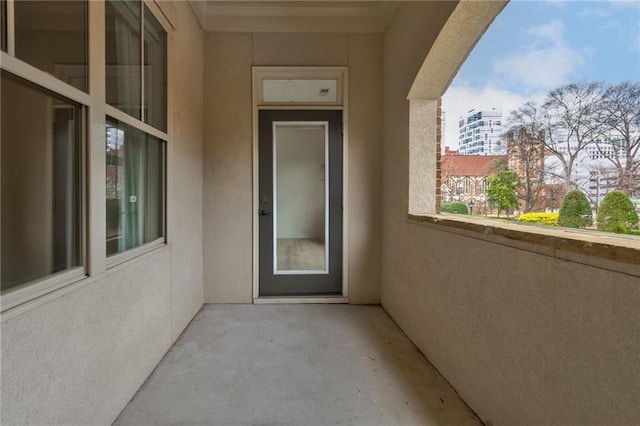 625 Piedmont Ave NE Unit 2004, Atlanta, GA 30308 - property entrance with stucco siding and a balcony