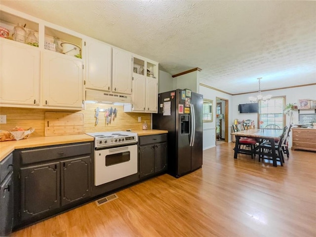 3769 Bay Creek Church Rd, Loganville, GA 30052 - kitchen with black fridge with ice dispenser, under cabinet range hood, white electric range, a chandelier, and light wood-type flooring