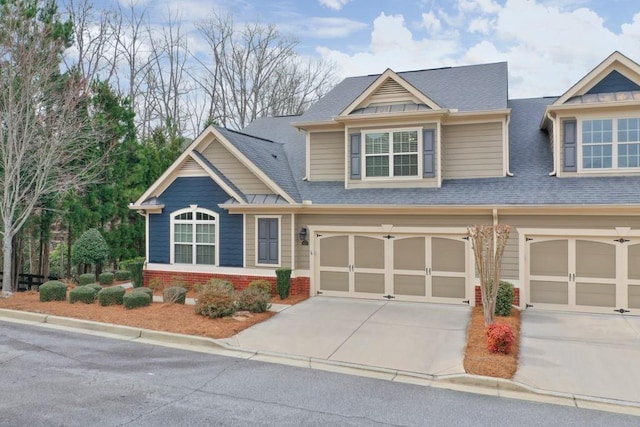 craftsman-style house featuring a garage