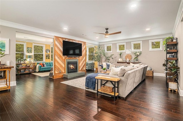 4435 Mossbrook Cir, Alpharetta, GA 30004 - living area featuring ornamental molding, a fireplace, healthy amount of natural light, a ceiling fan, and hardwood / wood-style floors