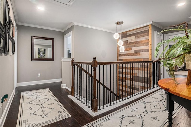 4435 Mossbrook Cir, Alpharetta, GA 30004 - hall with an upstairs landing, dark wood finished floors, ornamental molding, baseboards, and wood walls