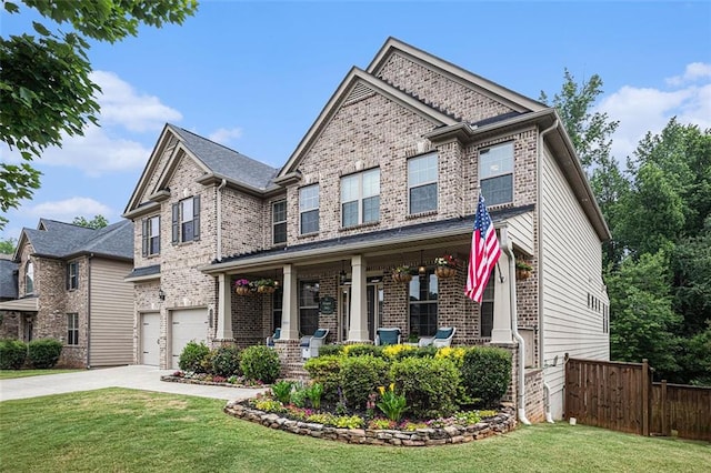 4435 Mossbrook Cir, Alpharetta, GA 30004 - craftsman inspired home featuring a porch, concrete driveway, brick siding, and an attached garage