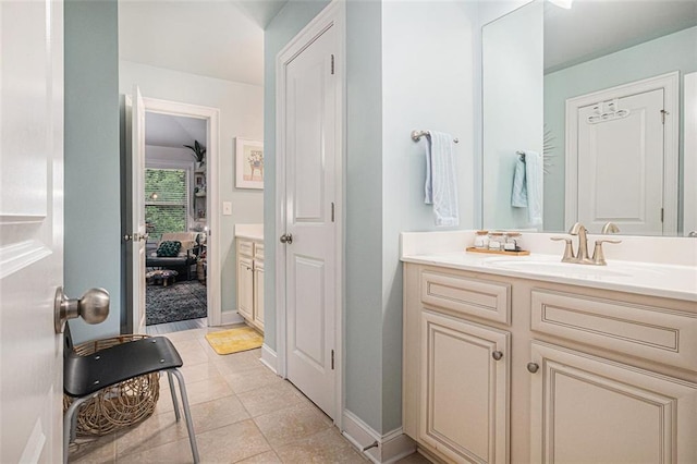 4435 Mossbrook Cir, Alpharetta, GA 30004 - bathroom with vanity, tile patterned flooring, and baseboards