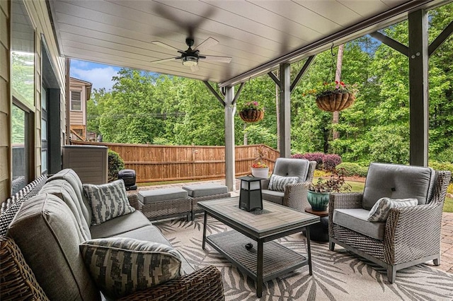 4435 Mossbrook Cir, Alpharetta, GA 30004 - fenced backyard with a ceiling fan, an outdoor living space, and a patio