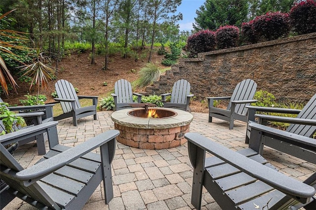 4435 Mossbrook Cir, Alpharetta, GA 30004 - view of patio featuring an outdoor fire pit