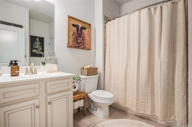 4435 Mossbrook Cir, Alpharetta, GA 30004 - full bath featuring toilet, tile patterned flooring, vanity, and curtained shower