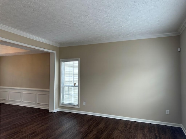 unfurnished room with ornamental molding, dark wood-style flooring, and a textured ceiling