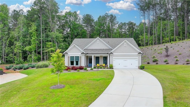 2129 Charmond Dr, Monroe, GA 30656 - craftsman inspired home featuring driveway, a garage, a front lawn, and a porch