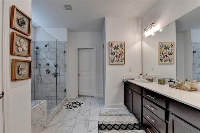 2129 Charmond Dr, Monroe, GA 30656 - full bath with marble finish flooring, a shower stall, and vanity